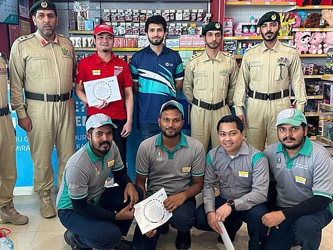 Officers from Lehbab Police Station visited the workers at the ENOC petrol station