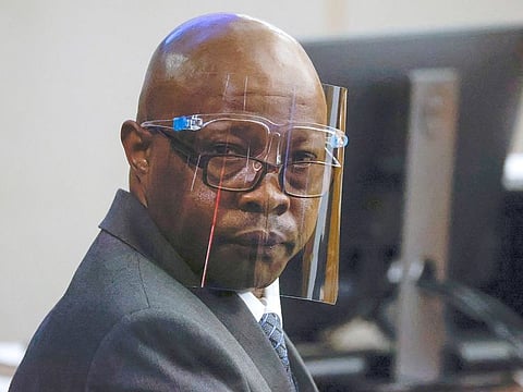 Accused serial killer Billy Chemirmir looks back ahead of his third trial at Frank Crowley Courts Building, on October 3, 2022, in Dallas.