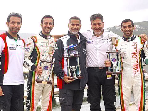 Rashid Al Qamzi and Mansoor Al Thani celebrate with team manager Guido Cappellini and teammates in Portugal last weekend.