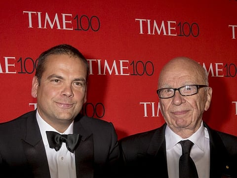 Rupert Murdoch (R) and Lachlan Murdoch arrive for the TIME 100 Gala in New York April 21.