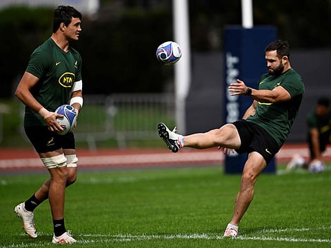 South Africa's lock Franco Mostert (left) and scrum-half Cobus Reinach take part in a training session at Fauvettes Stadium, in Domont, north of Paris.