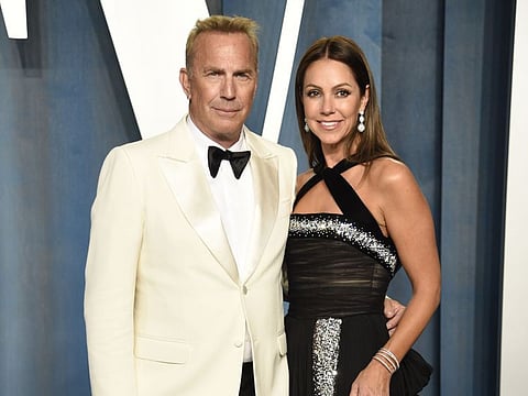 File photo of Kevin Costner with Christine Baumgartner