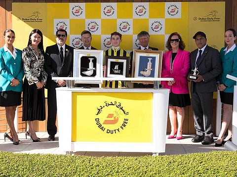 Last year's winner of the DDF Mill Reef Stakes - Team of Sakheer with trainer Roger Varian, owner's representative Oliver St Lawrence, jockey David Egan & groom Saeed Ahmad.