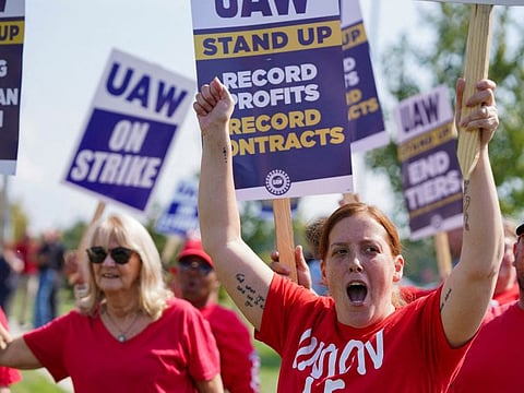 UAW President Shawn Fain has accused auto executives of engaging in a “race to the bottom” in the transition to EVs, with factories that will employ fewer workers making lower wages.