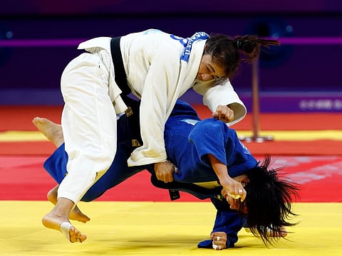 UAE's Bishrelt Khorloodoi and Uzbekistan's Diyora Keldiyorova in action during the Women 52Kg Final at the Xiaoshan Linpu Gymnasium during the Asian Games in Hangzhou, China on Sunday.