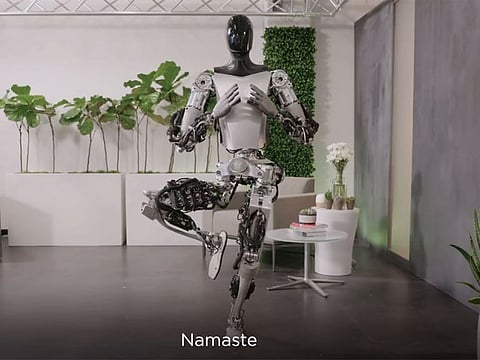 After a long day at work for the humanoid robot, 'it is time to stretch', ending with a Namaste