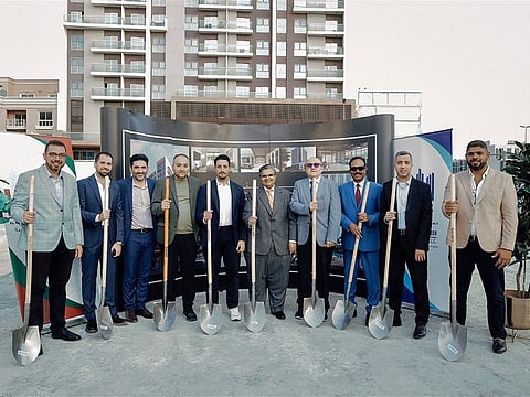 Kalpesh Kinariwala (centre), Pantheon Development flanked by Mr. Ghaleb AlSarraj, Al Serh Al Kabeer Construction (left) and Hanan Khawajah of Al Khawajah Engineering Consultants (right) at the signing ceremony