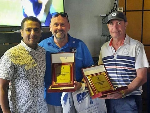 Roy Pirie and Rob Campbell with Mohamed Abdelfattah (left) Tower Links Director of Golf Operations
