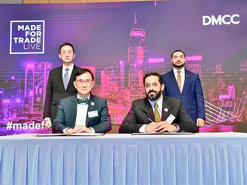 Dr. Aaron Shum, Founding President, HKMEBC (front left), to sign a MOU with Mr. Ahmed Bin Sulayem, Chairman & CEO. DMCC(front right), to signify ongoing cooperation between both parties to enhance HK-Dubai’s bilateral business relations. The signing was witnessed by Dr. Benard Chan, HKSAR Under Secretary for Commerce and Economic Development (rear left) and H.E. Shaikh Saoud Ali Almualla, UAE Consul General in the HKSAR (rear right)