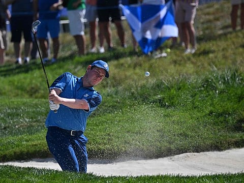 Europe's Robert MacIntyre plays from a green-side bunker on the 16th hole during practice ahead of the 44th Ryder Cup at the Marco Simone Golf and Country Club in Rome on Wednesday.