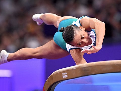 Uzbekistan's Oksana Chusovitina competes in the women's vault in the artistic gymnastics at the Asian Games in Hangzhou on Thursday.