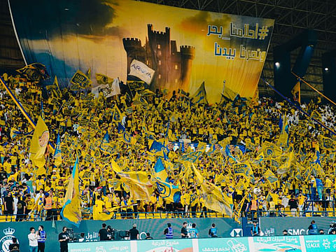 Fans of the Saudi club Al Nassr fervently support their team at a recent match.