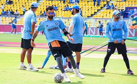 India's Virat Kohli warms up ahead of their ICC Cricket World Cup 2023 warm-up match against England at ACA Stadium, Barsapara in Guwahati on Saturday.