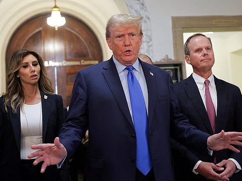 Former US President Donald Trump arrives at a Manhattan courthouse, for the trial of himself, his adult sons, the Trump Organization and others in a civil fraud case brought by state Attorney General Letitia James, in New York City, on October 2, 2023.