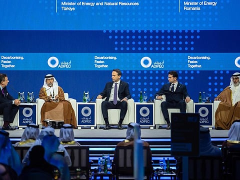 (From left to right) US Journalist and Professor at the New York University in Abu Dhabi, John Defterios, UAE's Energy Minister Suhail Al Mazrouei, Turkey's Energy Minister Alparsian Bayraktar, Romania's Energy Minister Sebastian-Ioan Burduja, and OPEC Secretary-General Haitham Al Ghais in a panel discussion at ADIPEC.