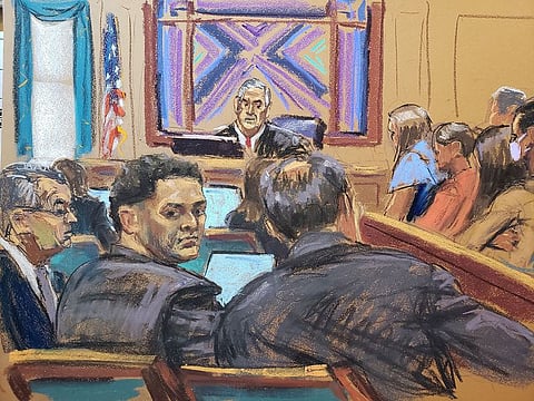 Sam Bankman-Fried sits beside his defense lawyer Christian Everdell on the first day of his fraud trial over the collapse of FTX, the bankrupt cryptocurrency exchange, at Federal Court in New York City in this courtroom sketch.