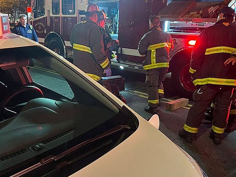 San Francisco firefighters attend the scene where Cruise, General Motors' robotaxi unit, said one of their autonomous vehicles struck and injured a pedestrian who had first been struck by another human-driven vehicle which fled the scene, in San Francisco, California, US.