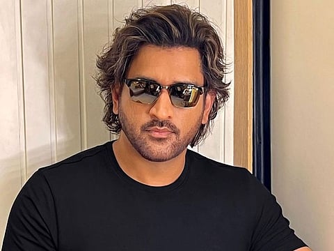 In the pictures, Dhoni could be seen in his new long-haired look, complimenting it with a black t-shirt and a pair of matching black shades.