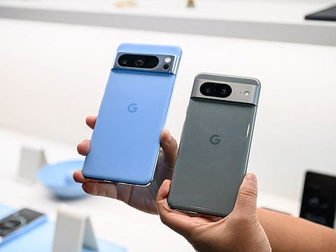 Google Pixel 8 and Google Pixel 8 Pro phones are displayed during a Google product launch event in New York.