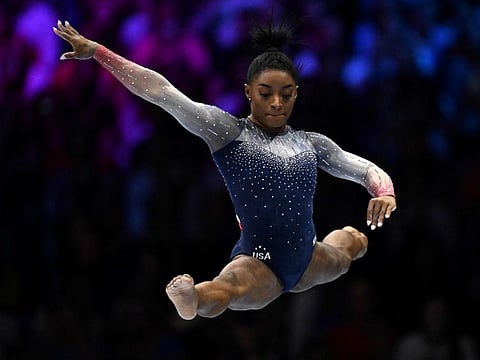 US' Simone Biles competes on the Balance Beam in the Women's Team Final during the 52nd FIG Artistic Gymnastics World Championships, in Antwerp, northern Belgium, on Wednesday.