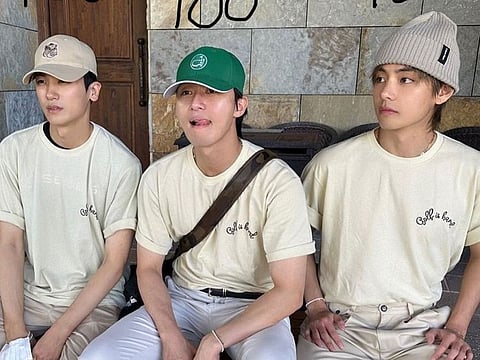 V, Hyung-sik and Seo-joon were spotted sporting matching 'Golf is hard' t-shirts.