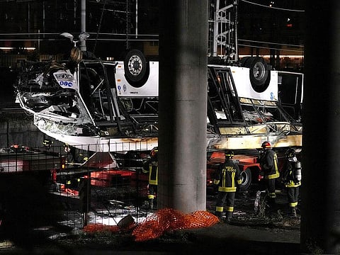 Italian firefighters work at the scene of a passenger bus accident in Mestre, near Venice, Italy, Wednesday, Oct. 4, 2023.