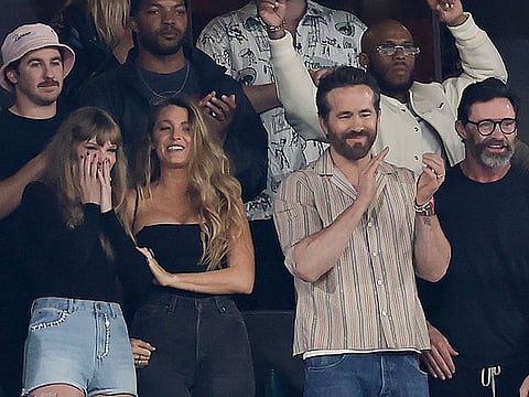 Taylor Swift, Blake Lively and Ryan Reynolds react during the first quarter of an NFL football game between the New York Jets and the Kansas City Chiefs in New Jersey.