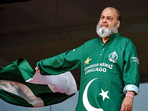 Chacha Mohammad Basheer, a Pakistani fan, waves national flag during the 2023 ICC Men's Cricket World Cup one-day international (ODI) match between Pakistan and Netherlands at the Rajiv Gandhi International Stadium in Hyderabad on October 6, 2023.