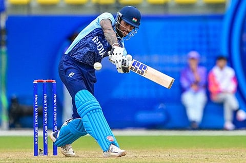 India's Tilak Varma plays a lofted drive during his unbeaten 55 against Bangladesh in the Asian Games semi-final in Hangzhou on Friday.