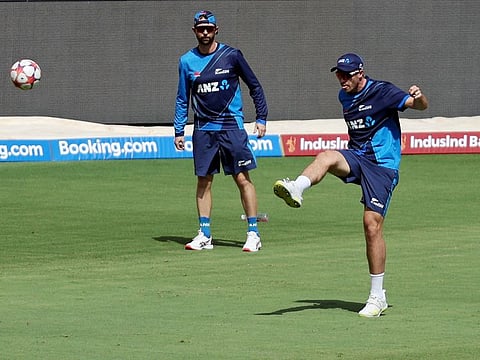 New Zealand's Devon Conway with Tim Southee during a practice session at the Narendra Modi Stadium, Ahmedabad.