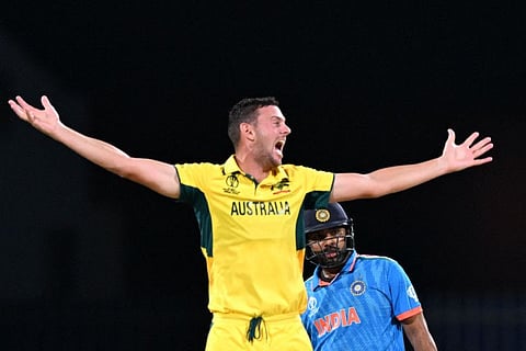 Australia's Josh Hazlewood celebrates the wicket of India's captain Rohit Sharma during the World Cup at the MA Chidambaram Stadium in Chennai on Sunday.