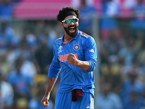 India's Ravindra Jadeja celebrates after taking the wicket of Australia's Alex Carey during the 2023 ICC Men's Cricket World Cup match on Sunday.