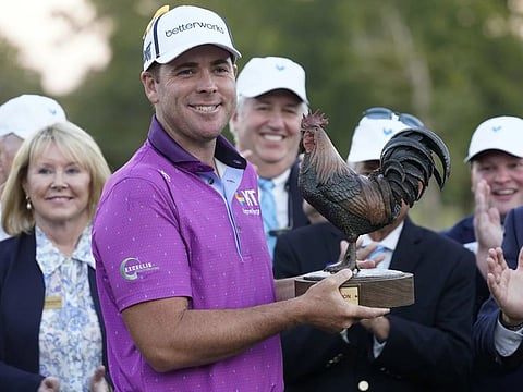 Luke List with Sanderson Farms Championship Trophy