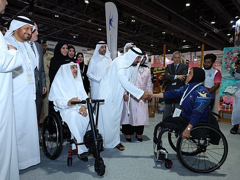 Sheikh Ahmed bin Saeed Al Maktoum, Patron of AccessAbilities Expo, interacts with participants at the event in Dubai on Monday