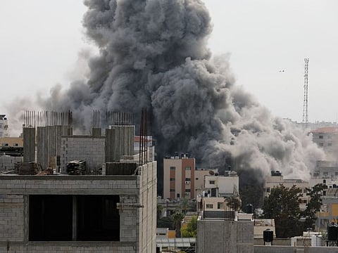 Smoke rises following Israeli strikes in Gaza, October 9, 2023.