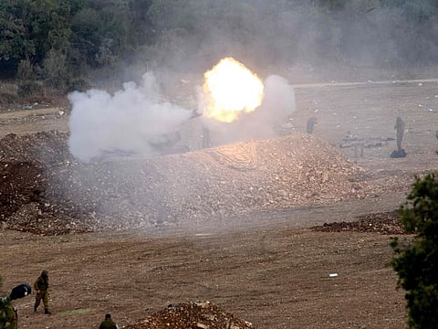 Israeli forces launch artillery fire towards southern Lebanon from the border zone in northern Israel on October 9, 2023, as Hezbollah denied involvement in  clashes or "any infiltration attempt" into Israel.