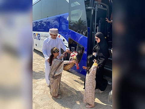 Omanis welcome riders from Ras Al Khaimah on first bus to arrive in Khasab, Musandam Governorate