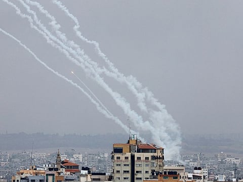Rockets are fired from Gaza towards Israel, in Gaza, October 9, 2023.