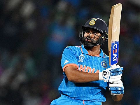 India’s captain Rohit Sharma plays a shot during the 2023 ICC Men's Cricket World Cup one-day international match against Afghanistan at the Arun Jaitley Stadium in New Delhi on October 11, 2023. He scored 131 to guide India to eight-wicket win.