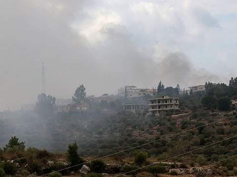 Smoke rising on a hill shelled by Israeli forces on the outskirts of the southern Lebanese border village of Dhaira on October 11, 2023.