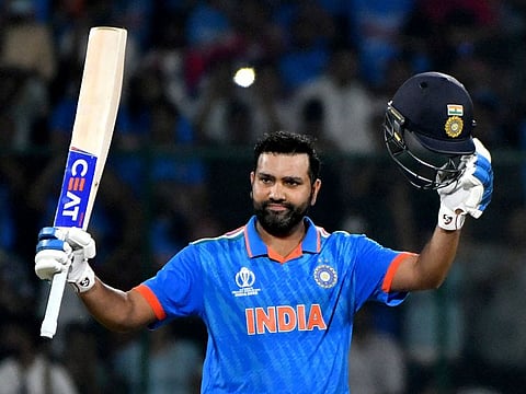 Indian skipper Rohit Sharma celebrates his record seventh century against Afghanistan in New Delhi on Wednesday.