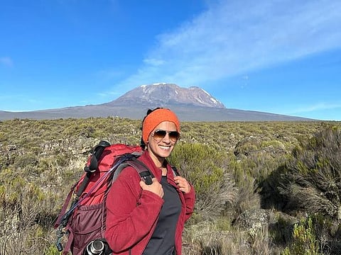 Nadiera Senali Veedu, with the peak in the background