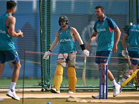 Australia's Sean Abbott (centre), Cameron Green (second from right) and Josh Hazlewood attend a practice session on the eve of their World Cup match against Sri Lanka at the Ekana Cricket Stadium in Lucknow on Sunday.