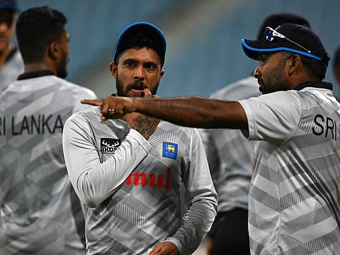 Sri Lanka's Kusal Mendis listens to his team consultant Mahela Jayawardene during a practice session on the eve of their Cricket World Cup match against Australia at the Ekana Cricket Stadium in Lucknow on Sunday.