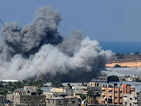 Smoke billows after an Israeli air strike in Rafah in the southern Gaza Strip on October 16, 2023