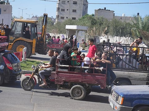 Palestinians flee to the southern Gaza Strip after the Israeli army issued an evacuation warning to a population of over 1 million in northern Gaza and Gaza City to seek refuge in the south ahead of a possible Israeli ground invasion.