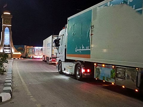 A convoy of trucks carrying humanitarian aid from Egyptian NGOs for Palestinians start to move from Al-Arish to Rafah city as they wait for an agreement on the opening on the Rafah border crossing to enter Gaza, amid the ongoing conflict between Israel and Hamas, in the city of Al-Arish, Sinai peninsula, Egypt.