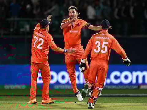 Netherlands' Paul van Meekeren (centre) celebrates the wicket of South Africa's Marco Jansen with teammates during the Cricket World Cup at the Himachal Pradesh Cricket Association Stadium in Dharamsala on Tuesday.