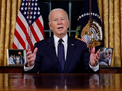In the Oval Office of the White House in Washington, D.C., U.S. President Joe Biden delivers a rare televised address to the nation, discussing his strategies regarding the Israel-Hamas conflict, humanitarian aid in Gaza, and ongoing support for Ukraine