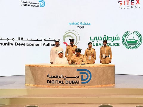 Dubai Police and CDA officials during the MoU signing at Gitex tech show in Dubai